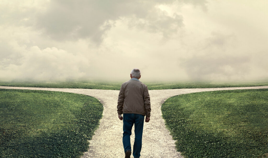 A senior employee choosing between 2 roads