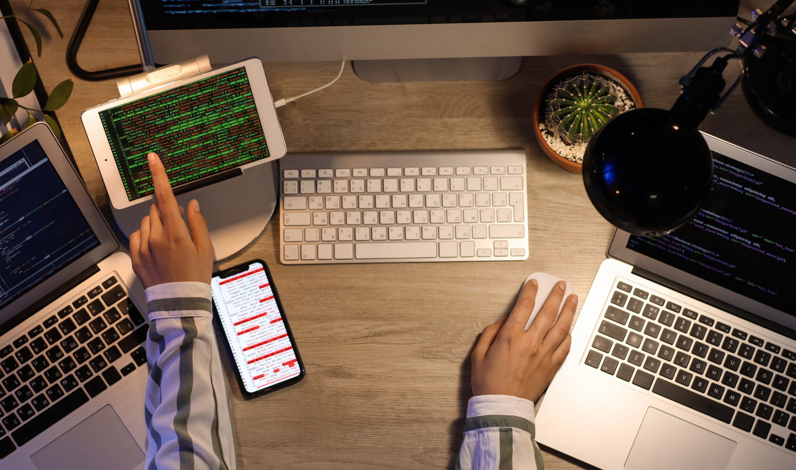 iSwerk | Remote Jobs | Remote Staffing | A web developer doing a bit of coding to show 