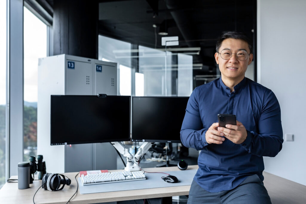 A seemingly well-off software engineer with cool accessories and tech equipment.