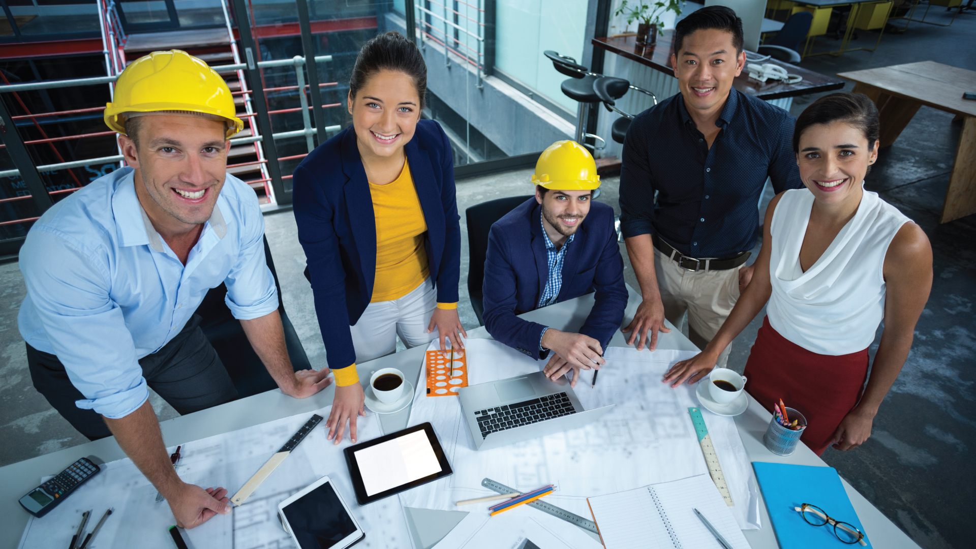 Remote Work - iSWerk employees in construction gear ready to support on-site construction team.