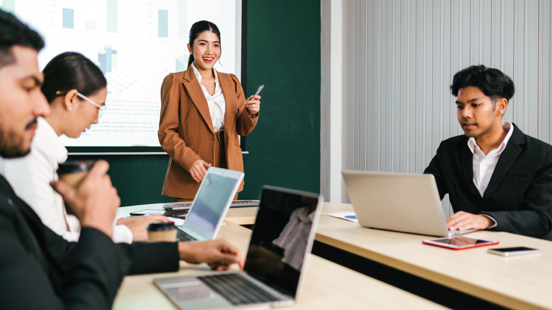 Remote Staffing - training session being conducted in a meeting. Better with iSWerk branding.